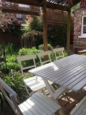 Garden seating area at 25 Barbican Road
